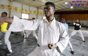 African Men Practicing Martial Arts