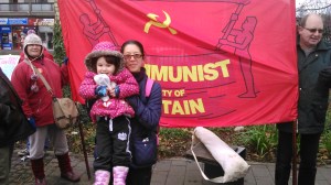 Gee & Mei-an in front of the Red Banner of Freedom