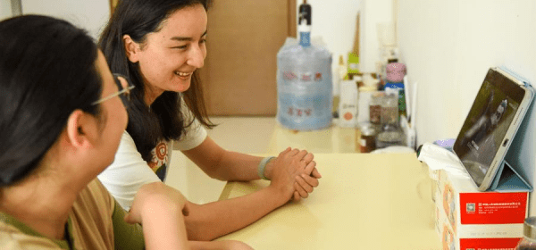 Female employees enjoy TV series during break time at their dormitory room of Xinjiang Middle Hoshine Silicon Industry in the suburb of Urumqi, northwest China's Xinjiang Uygur Autonomous Region, Aug. 29, 2024. (Xinhua/Gao Han)