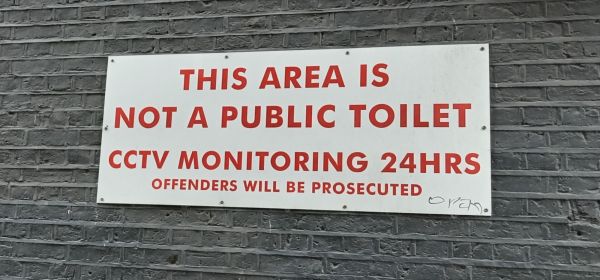 toilet warning city road