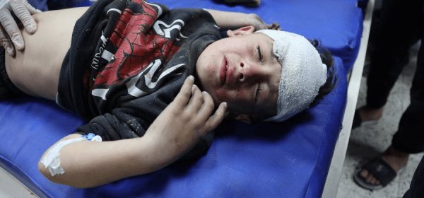 An injured child is seen at Al-Ahli Arab Hospital after an Israeli airstrike in Gaza City, on Dec. 19, 2024. (Photo by Abdul Rahman Salama/Xinhua)