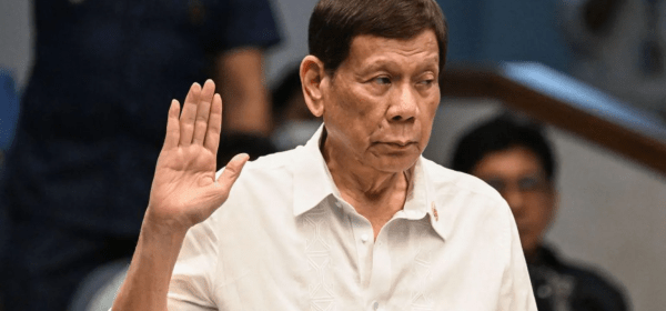 Rodrigo Duterte, seen here in October at a senate probe into the drug war during his administration, has been taken into police custody