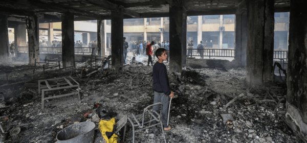 Palestinians are seen at a school after an Israeli airstrike in Gaza City, on April 23, 2025.