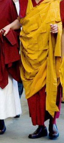 Corrupt 14th Dalai Lama in Guccis!