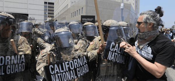 California National Guard soldiers confront protesters in front of the Los Angeles Federal Detention Center, in Los Angeles, California, the United States, June 8, 2025. (Photo by Qiu Chen/Xinhua)