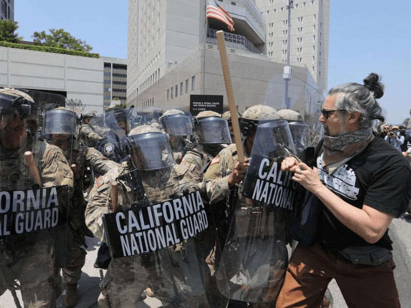 California National Guard soldiers confront protesters in front of the Los Angeles Federal Detention Center, in Los Angeles, California, the United States, June 8, 2025. (Photo by Qiu Chen/Xinhua)