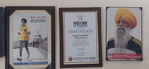 Mementoes and certificates on the wall at Singh's house in Punjab