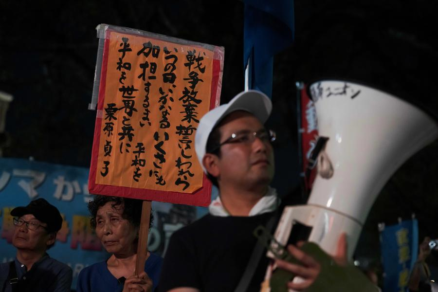 This photo taken on Aug. 5 shows protesters gathering at Hiroshima Atomic Bomb Dome, Hiroshima, Japan to criticize the Japanese government's ongoing military buildup policies. (Xinhua/Jia Haocheng)
