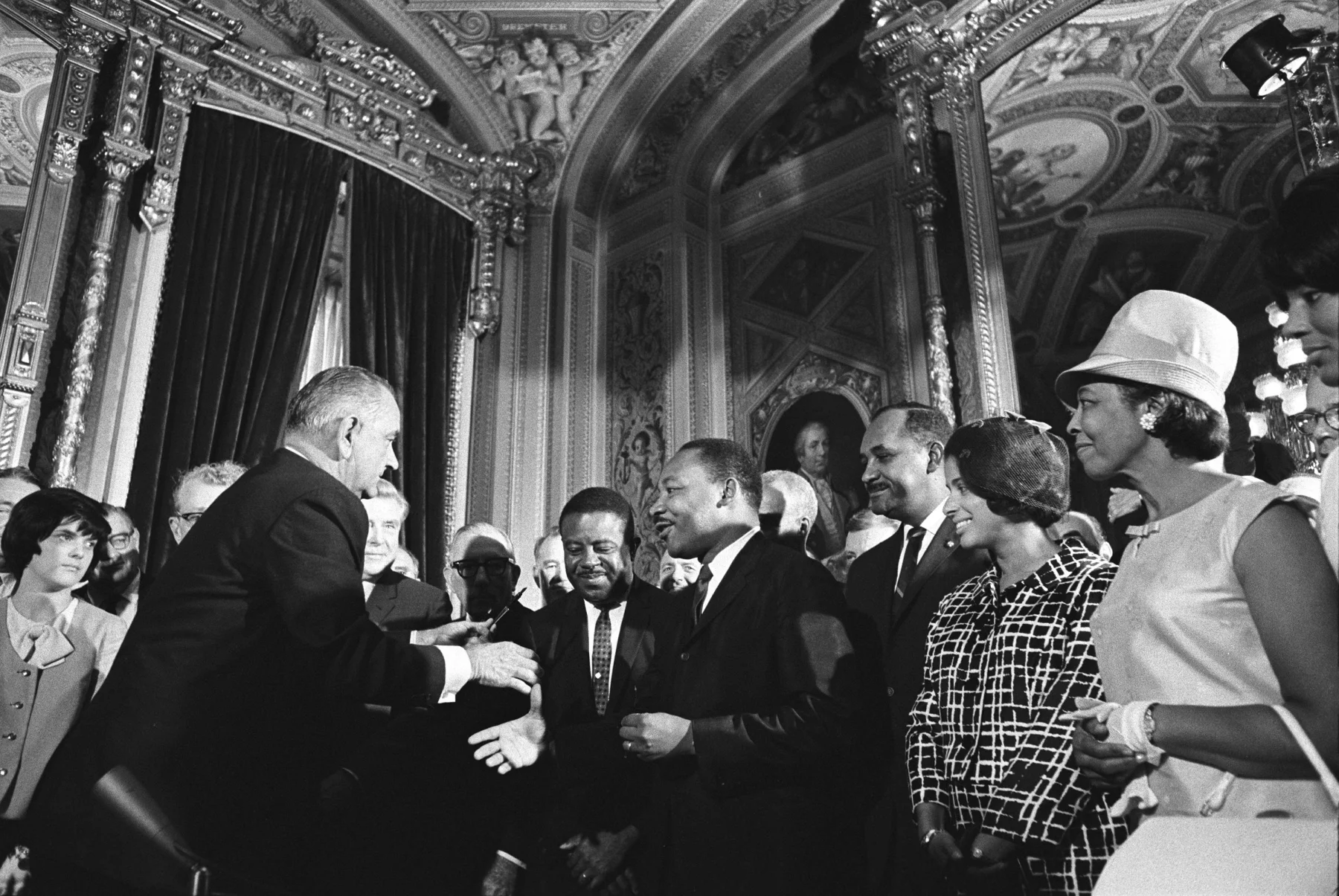 President Lyndon B. Johnson moves to shake hands with Martin Luther King Jr. while others look on after Johnson signed the federal Voting Rights Act into law at the U.S. Capitol in Washington, D.C., on Aug. 6, 1965.

Yoichi Okamoto/Lyndon B. Johnson Library
