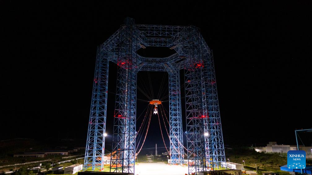 This file photo shows a manned lunar lander during a trial at a test site in Huailai County, north China's Hebei Province. China on Thursday announced that it has successfully completed a comprehensive test for the landing and takeoff of its manned lunar lander at a test site in Huailai County, Hebei Province. The test completed on Wednesday represents a key step in the development of China's manned lunar exploration program, and it also marks the first time that China has carried out a test for extraterrestrial landing and takeoff of a manned spacecraft, said the China Manned Space Agency. (Photo by Zhang Bin/Xinhua)