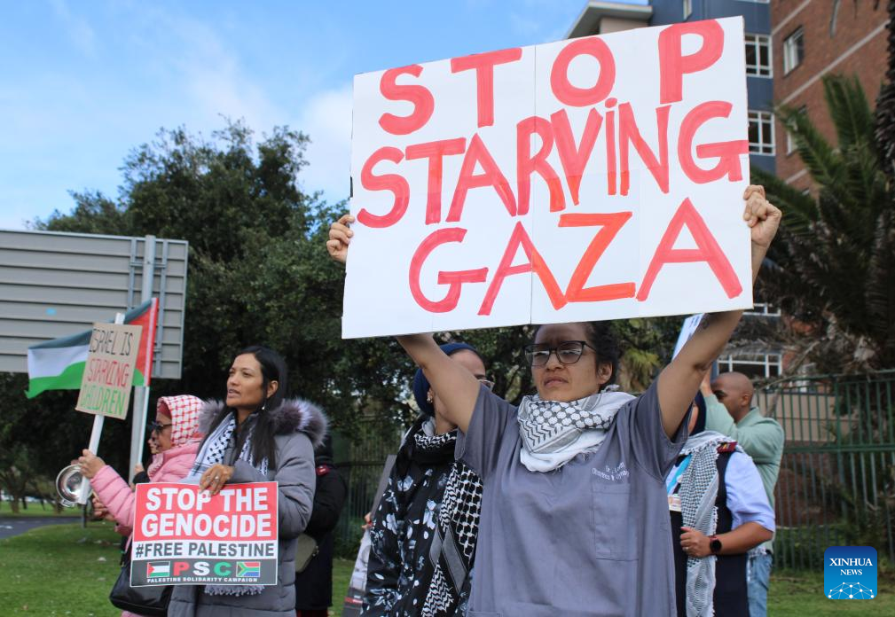 Healthcare workers protest Israel's weaponization of hunger and mass starvation in Gaza, in Cape Town, South Africa, on Aug. 7, 2025. South African healthcare workers from both public and private hospitals nationwide took part in the protest on Thursday. (Photo by Shakirah Thebus/Xinhua)