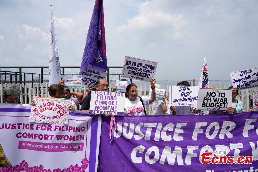 Demonstrators take part in a march in Manila, the Philippines, Aug. 14, 2025, urging the Japanese government to acknowledge wartime atrocities against “comfort women,” apologize, and compensate surviving victims and their families. 