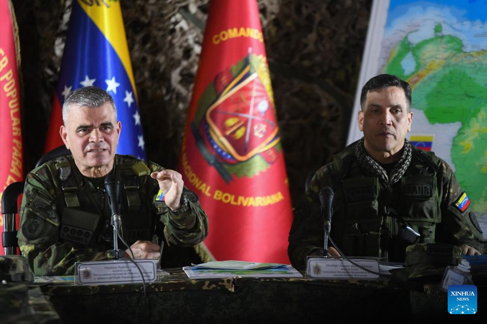 Venezuelan Defense Minister Vladimir Padrino Lopez (L) speaks during a press conference held in Caracas, Venezuela, Aug. 31, 2025. Venezuela is prepared for "any attack" from the United States, Venezuelan Defense Minister Vladimir Padrino Lopez said on Sunday.