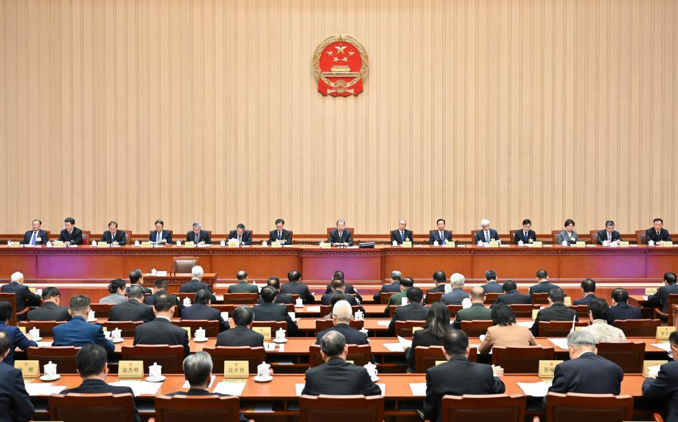 Zhao Leji, chairman of the National People's Congress (NPC) Standing Committee, presides over the first plenary meeting of the 18th session of the 14th NPC Standing Committee at the Great Hall of the People in Beijing, capital of China, Oct. 24, 2025. (Xinhua/Yue Yuewei)