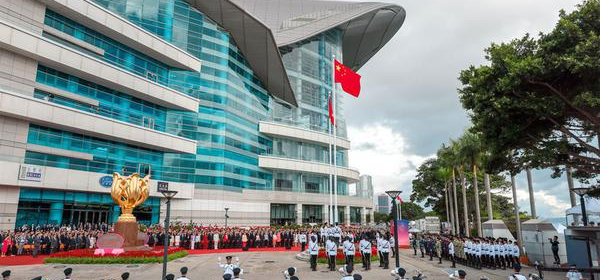 Officials and guests make a toast during a reception commemorating the 28th anniversary of the establishment of the Hong Kong Special Administrative Region, at the Hong Kong Convention and Exhibition Centre on July 1, 2025. (Photo by Andy Chong/China Daily)