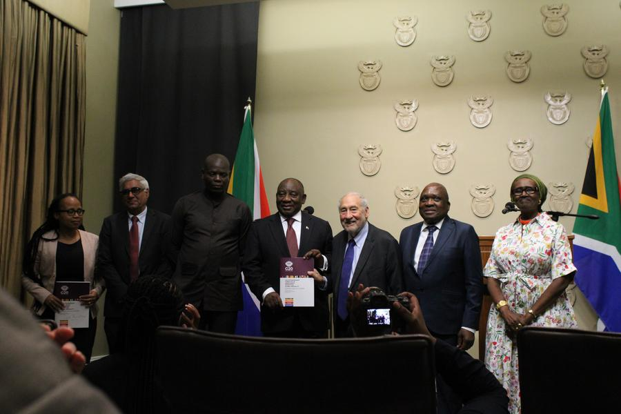 South African President Cyril Ramaphosa (4th R) receives the G20 Extraordinary Committee Report on Global Inequality from Nobel Laureate Joseph Stiglitz (3rd R), UNAIDS Executive Director Winnie Byanyima (1st R), and four other leading global experts of the committee at a ceremony in Cape Town, South Africa, on Nov. 4, 2025. (Photo by Shakirah Thebus/Xinhua)