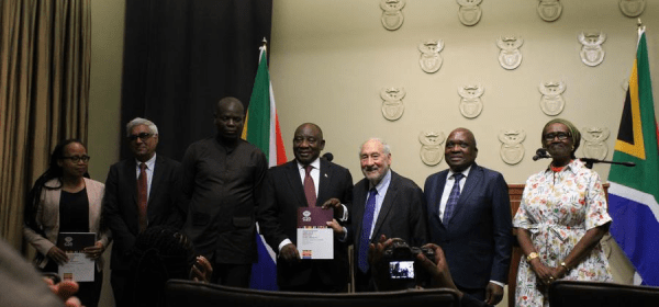 South African President Cyril Ramaphosa (4th R) receives the G20 Extraordinary Committee Report on Global Inequality from Nobel Laureate Joseph Stiglitz (3rd R), UNAIDS Executive Director Winnie Byanyima (1st R), and four other leading global experts of the committee at a ceremony in Cape Town, South Africa, on Nov. 4, 2025. (Photo by Shakirah Thebus/Xinhua)