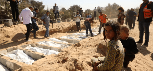 This photo taken on Oct. 22, 2025 shows the burial of the unidentified bodies of Palestinians in Deir al-Balah, central Gaza Strip. (Photo by Rizek Abdeljawad/Xinhua)
