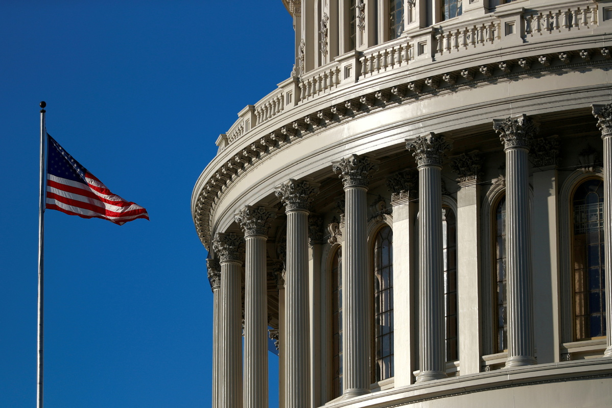 An American flag flies outside of the US Capitol dome in Washington, US, Jan 15, 2020. [Photo/Agencies]