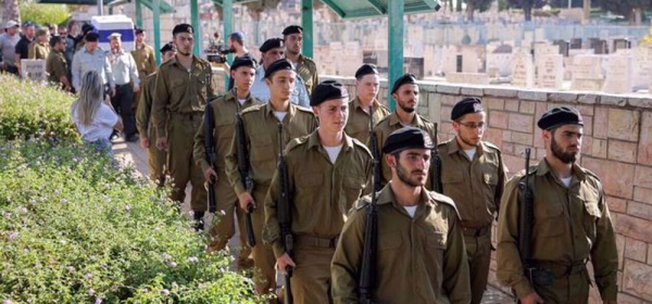 This image shows Israeli forces at the Rishon LeZion cemetery in occupied Palestine on July 16, 2025. (Photo by AFP)