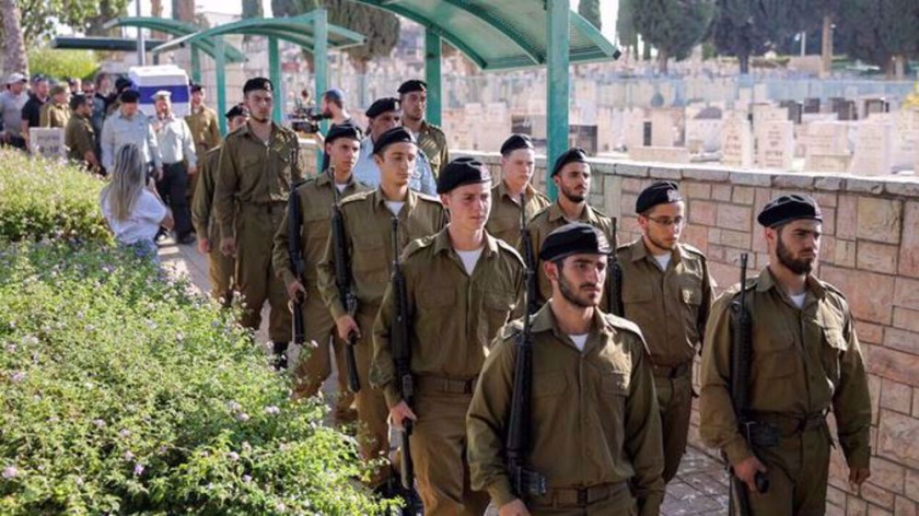 This image shows Israeli forces at the Rishon LeZion cemetery in occupied Palestine on July 16, 2025. (Photo by AFP)