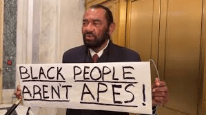 Rep. Al Green ejected from Trump's State of the Union after holding a 'Black People Aren't Apes' sign