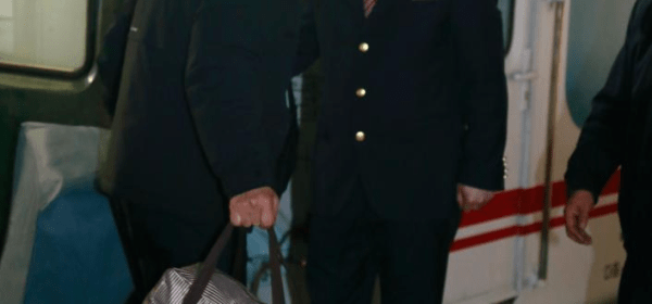 A passenger of an international passenger train from Dandong of China to Pyongyang of the Democratic People's Republic of Korea (DPRK) arrives in Pyongyang, the capital of the DPRK, March 12, 2026.