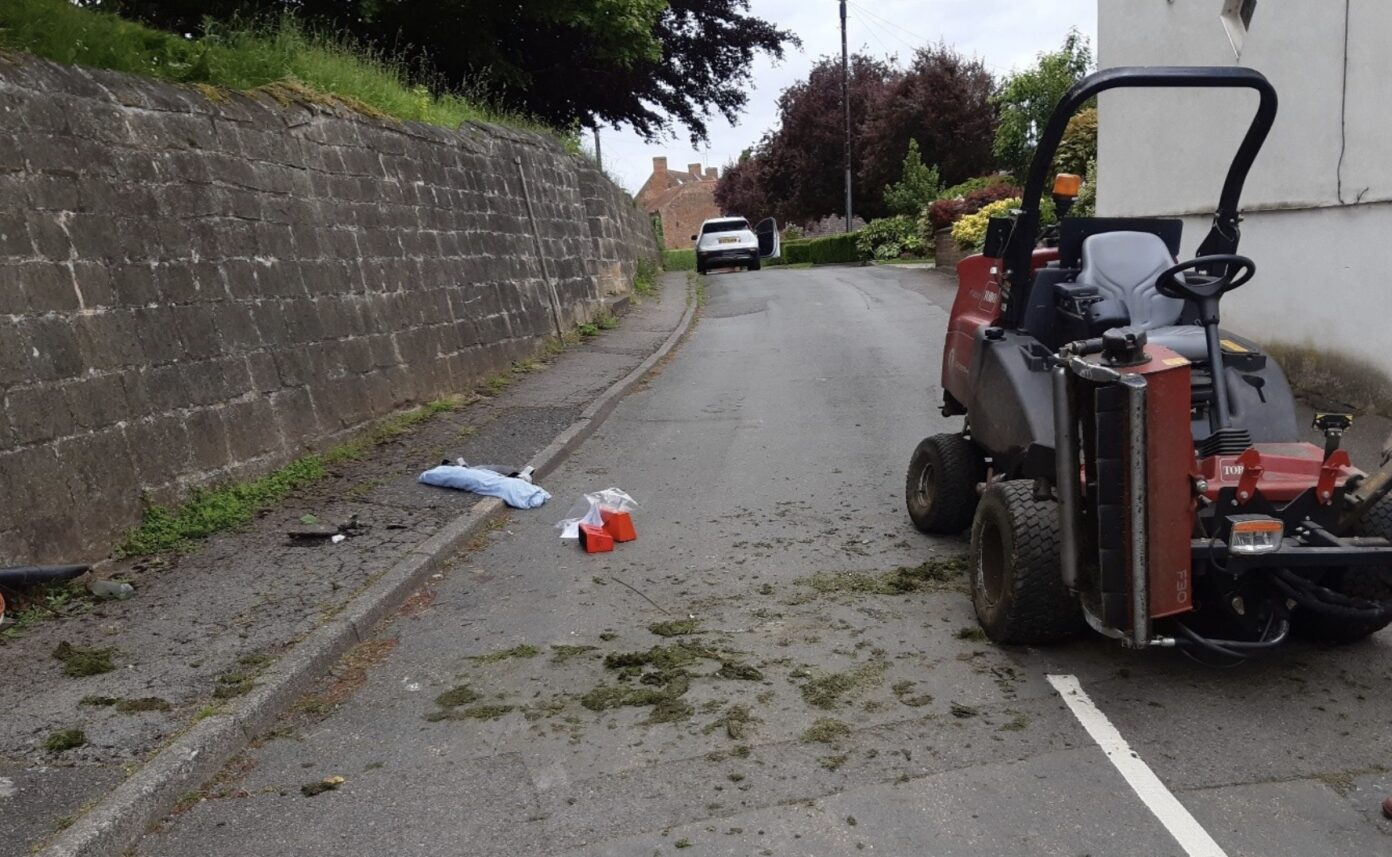 Photograph taken on the day of the incident showing the location of the ride-on mower following the accident.