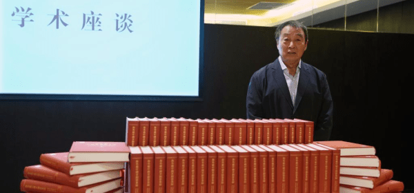 Professor Zhu Fenghan, the lead editor of a sixty-volume compendium documenting more than 23,000 ancient Chinese bronze artifacts lost abroad, poses for a photo during a press conference for the books' release in east China's Shanghai, April 19, 2026. (Xinhua/Liu Ying)