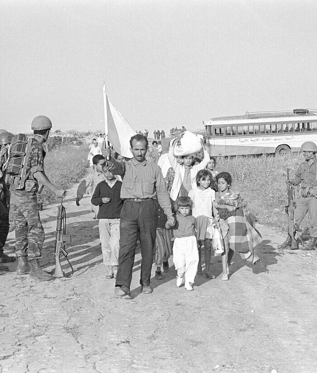 Palestinian refugees fleeing villages captured in the Latrun area. The IDF expelled them, and the JNF built Canada Park over the ruins. Credit: Benia Ben-Nun
