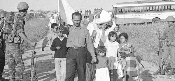 Palestinian refugees fleeing villages captured in the Latrun area. The IDF expelled them, and the JNF built Canada Park over the ruins. Credit: Benia Ben-Nun