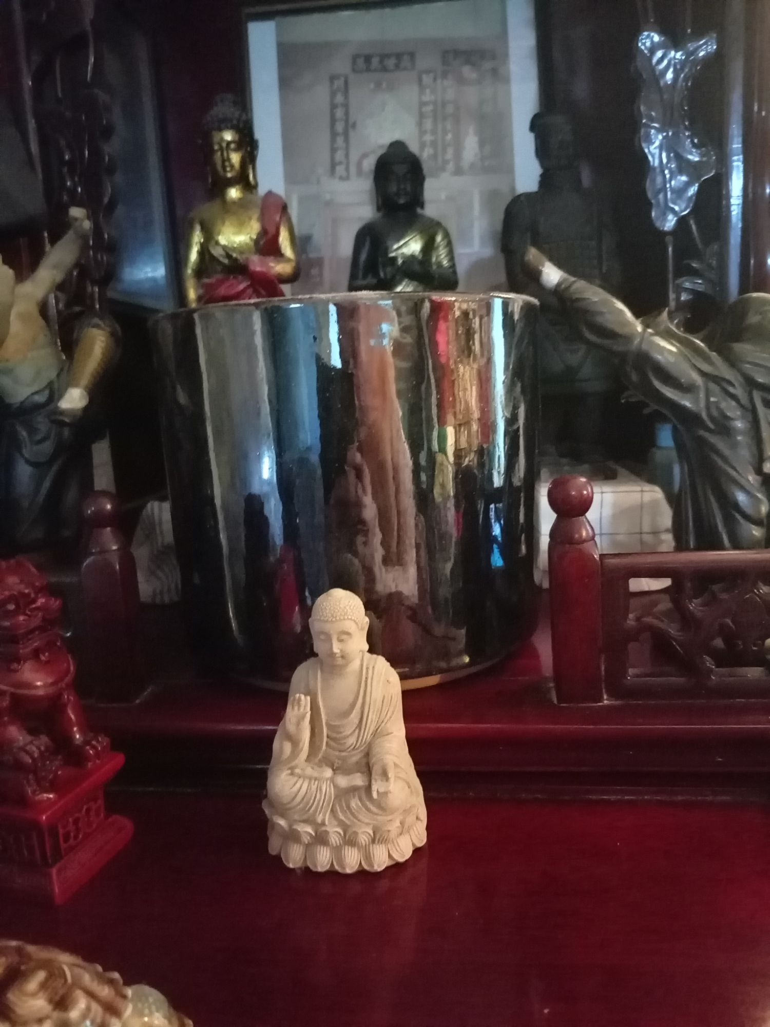 We have cleaned and re-arranged the family shrine (坛 – Tan) or “Altar” (spiritual platform) – that is the wooden device situated in a corner of our flat - which serves as a door-way between the material (seen) world and the unseen (immaterial) world. It is the place that serves to remember the “Way” (道 – Dao) – or the underkying (natural) pattern of reality in both essence and manfstation. Most Chinese families possess one of these devices as Confucianism has always emphasised spiritual practice within the family setting. The Confucian scholars borrowed this idea from the Change Classic (易經 – Yi Jing) – which is much older. Interestingly, although Daoism and Buddhism does have a monastic component which advocates leaving the family – the Confucian aspect does permit this monastic practice to be carried-out within the family home (this interfaces with the teachings of the Altar Sutra and the Vimalakirti Sutra). Although isolatory training can be helpful – in reality – whatever is achieved in isolation, it must be applied within ordinary life. This explains why many Chinese Buddhists are allowed to wear monastic robes within the family home – this is a distinct aspect of Chinese (Mahayana) Buddhism. Even as ex-monastic often earns the write to retain their monastic name and attire within the lay community.
Even if no member of a Chinese family has not trained in a formal spiritual order – incense will be regularly lit, and fresh flowers and fruit will be added every so many days. Of course, some shrines are kept-up at a greater degree than others – but this does not matter in the end. A family shrine is a door-way between one plane and another. It is a two-way structure that permits a solemn respect to trsverse from the material realm into the immaterial realm – and allows a positive spiritual reality to emanate from the immaterial plane to the material realm. Today, I talked to my deceased father – and I did this via a photograph that my mother took and printed-out for me probably around 2010. The photograph was taken in the front garden of our old home at 2 Torbay Road, Torquay Road, Torquay, Devon (the shyster landlord took over a hundred thousand pounds in rent between 2002-2018 before applying a no-fault eviction because we requested a repair be made). As this was 16-years ago – my father would have been around 68-years old at the time. I suppose my father was at the peak of his power as an elderly person! Tomorrow we will collectively lit incense. It is the next stage of respectful mourning.