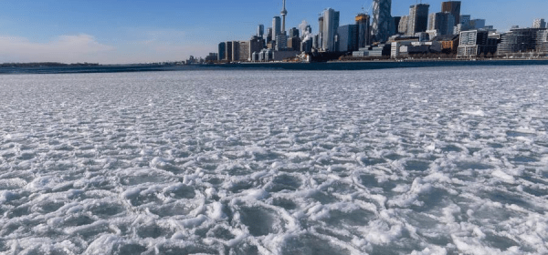 This photo taken on Jan. 21, 2025 shows the frozen Lake Ontario in Toronto, Canada. (Photo by Zou Zheng/Xinhua)