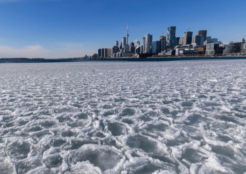 This photo taken on Jan. 21, 2025 shows the frozen Lake Ontario in Toronto, Canada. (Photo by Zou Zheng/Xinhua)