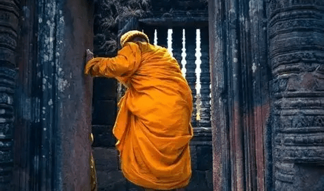 A Theravada Buddhist Monk in the Ruins of “Wat Phu (ວັດພູ)”!