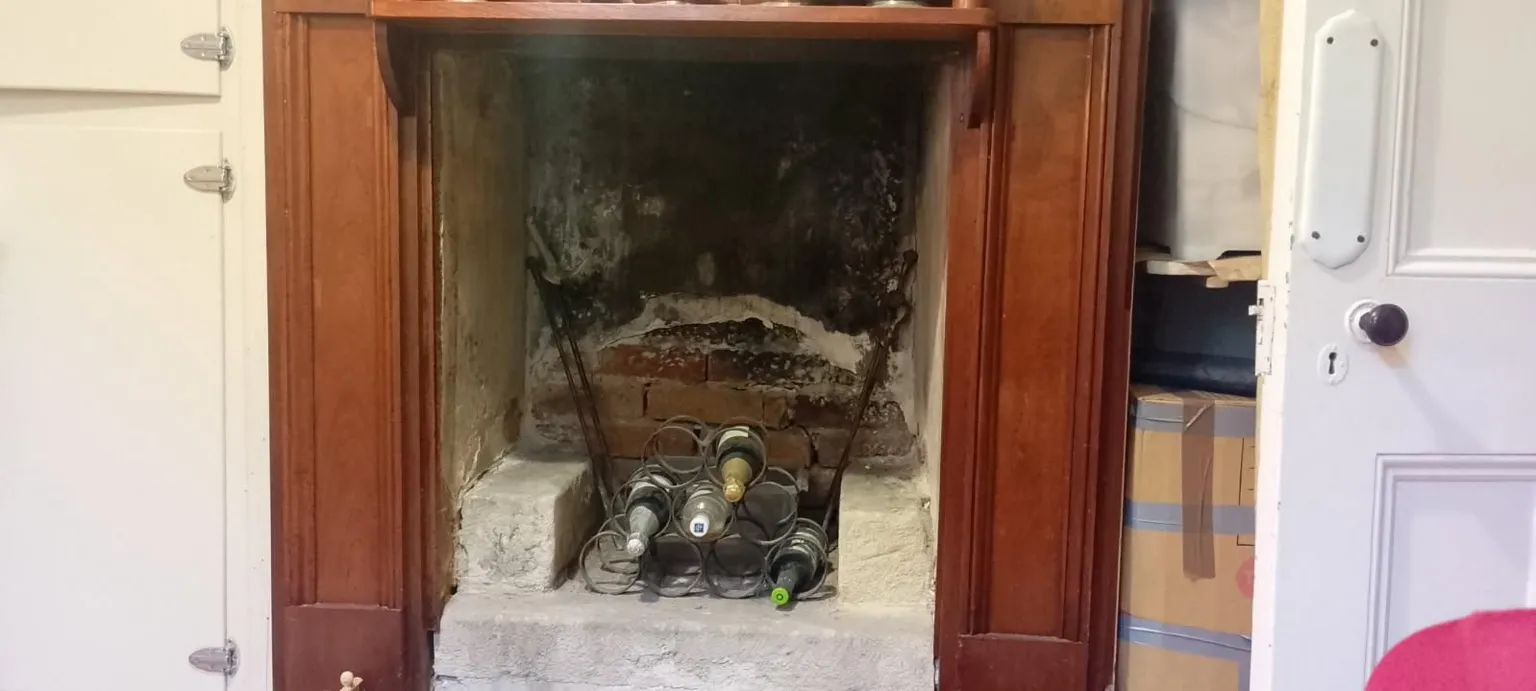 The fireplace where the book was found had been sealed for decades