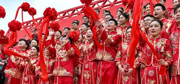 A total of 260 couples participate in a group wedding in Hefei City, capital of east China's Anhui Province, May 20, 2026. (Photo: China News Service/Han Suyuan)