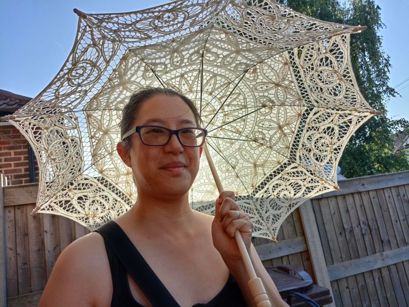 Beautiful Gee Borrowing Mei-An's Umbrella!