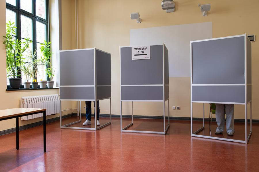 Voters fill their ballots at a polling station in Magdeburg, Germany, Sept. 6, 2026. The far-right Alternative for Germany (AfD) has won Sunday's state election in Saxony-Anhalt with a record 44.5 percent of the vote, according to an exit poll released by public broadcaster ARD. (Xinhua/Zhang Haofu)