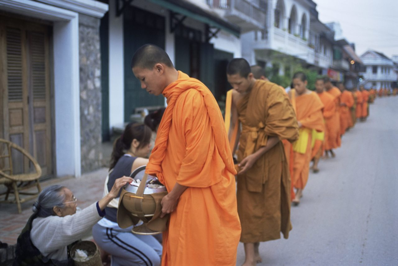 Buddhist Monks in Laos On Their Daily Rounds of Begging!