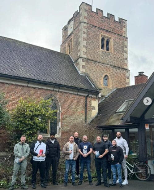 Danny Tommo with friends and members of South London Patriots at St Lawrence church Morden