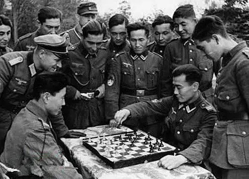 Trusted Asian Soldiers Play Chess - Nazi German Army